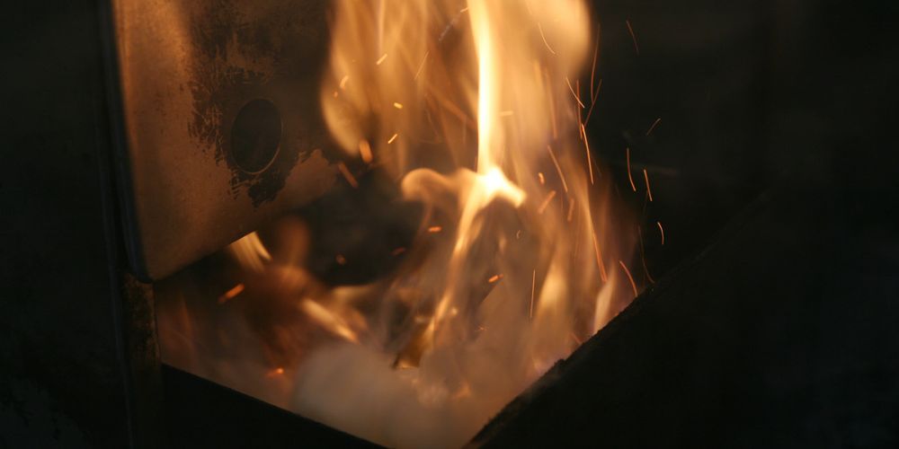 Welsh Oak chips smoking in kiln.